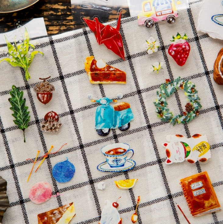 Small The Fortune PET Tape lucky symbol pieces arranged on a checkered surface, detail view
