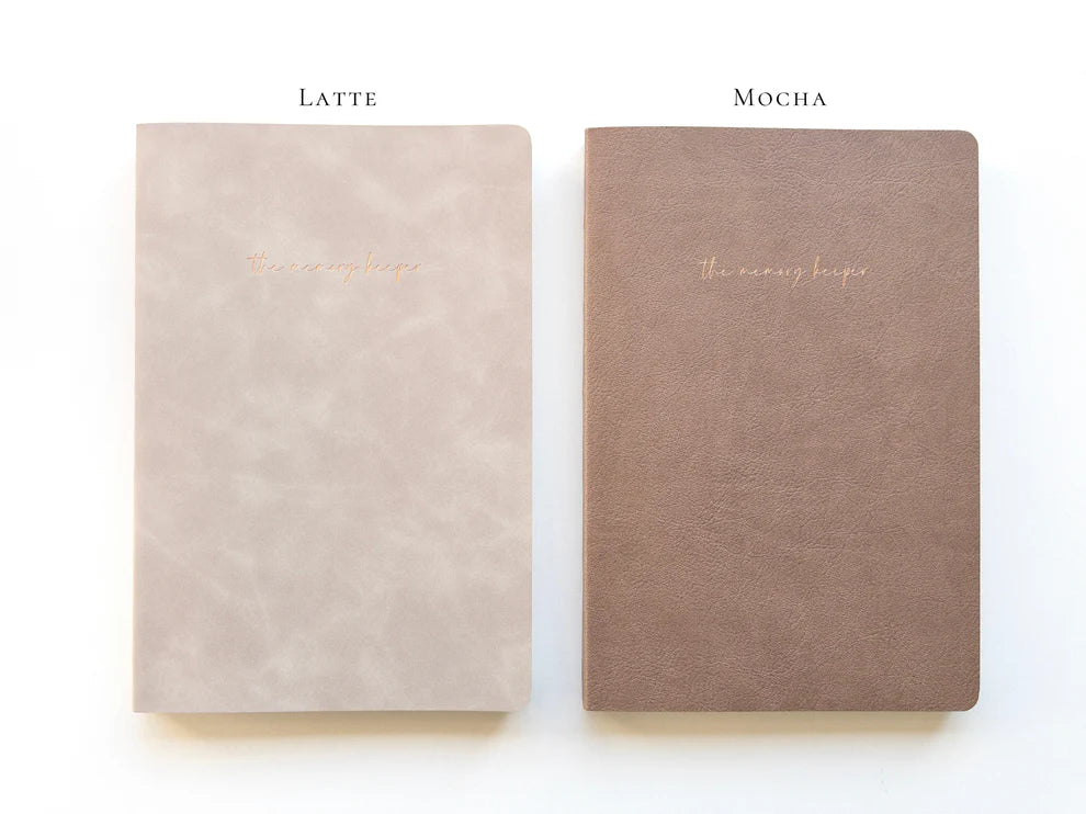 Two Memory Keeper journals in latte and mocha shades displayed together on a white background