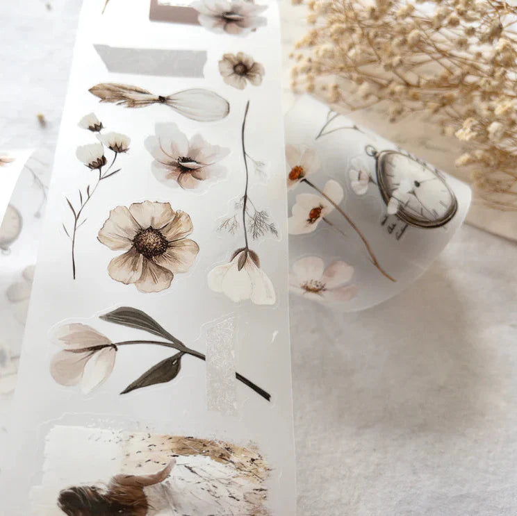 Two clear sheets of Timeless PET Tape floral and nature designs on a light background
