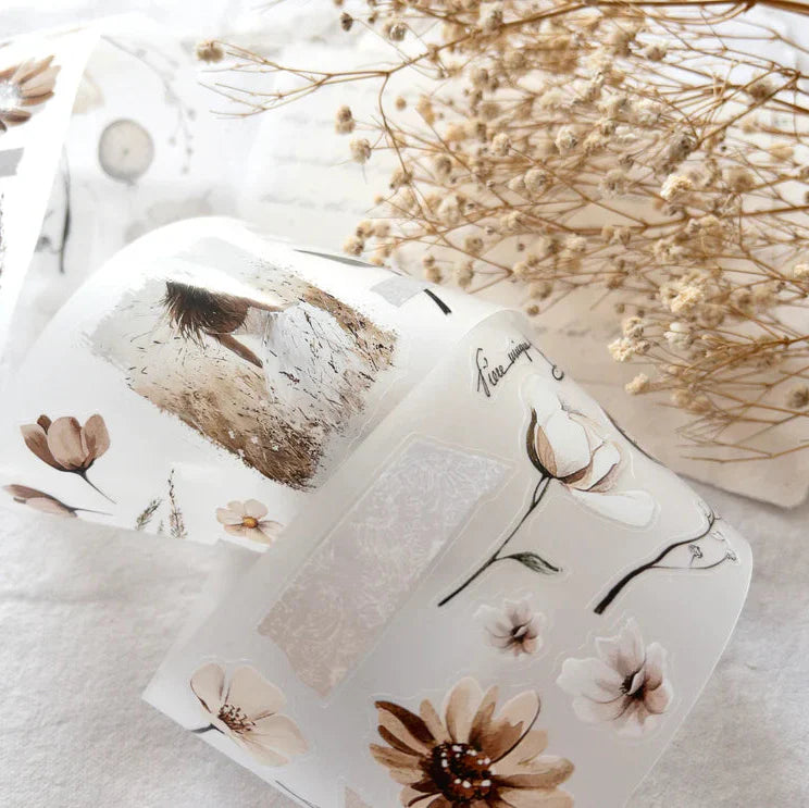 Phone case decorated with a Timeless PET Tape floral design on a light background