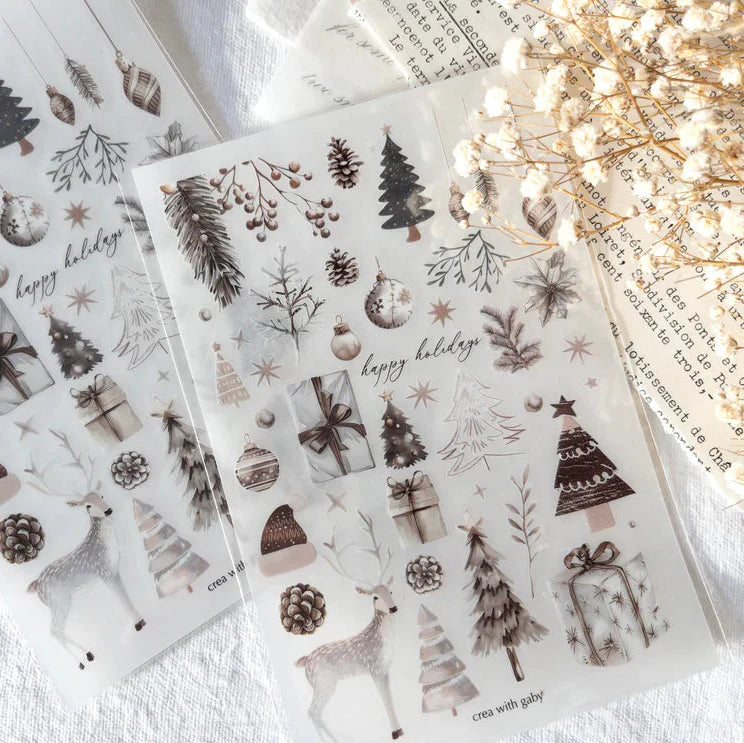 Christmas Selection Transfer Sticker festive motifs laid out together on a white surface