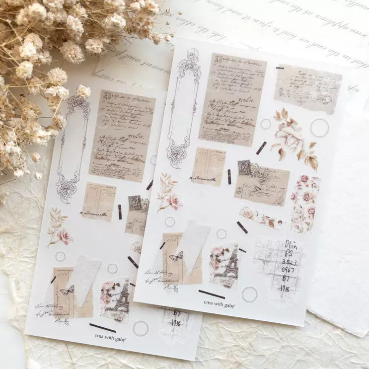 French Romance Transfer Sticker sheet of floral and script designs on a textured surface