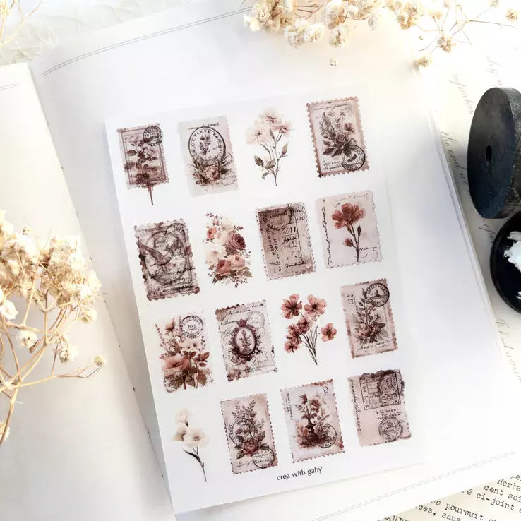 Penny Post Transfer Sticker sheet of floral vintage postal designs on a white surface