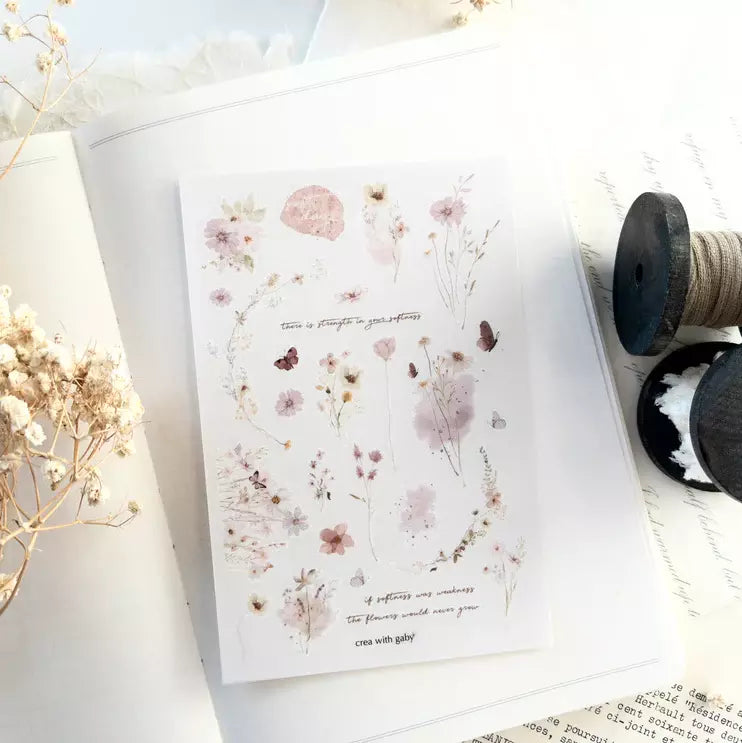 Soft Days Transfer Sticker floral designs on a card with dried flowers on a white surface
