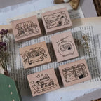 Set of wooden stamps with illustrations on a book page