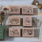Set of wooden stamps with cartoon designs on a book page background