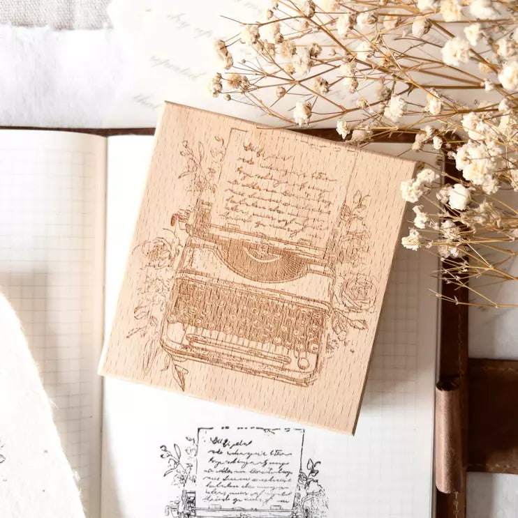 Typewriters Rubber Stamp design on a wooden bookmark styled on a book with florals