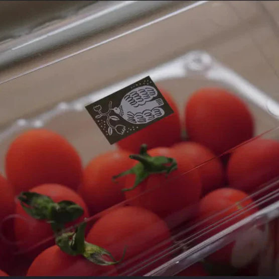 Umber Label Sticker Tape label applied to a clear container of tomatoes, styled use idea
