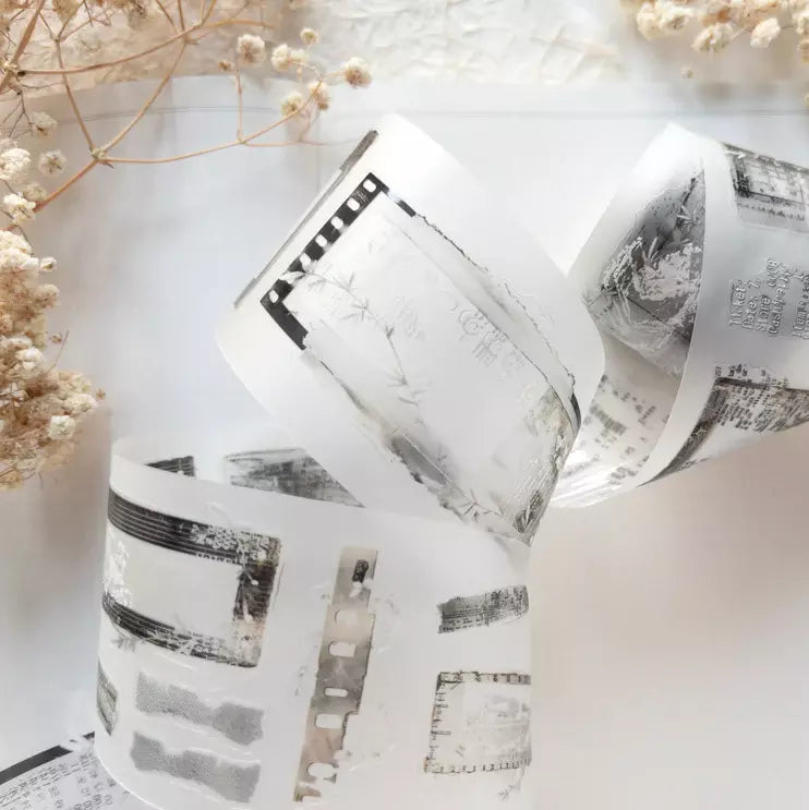 Untold PET Tape geometric monochrome ribbon strip with dried flowers on a light background
