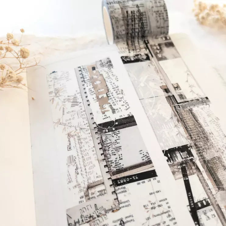 Roll of Untold Washi Tape by crea with gaby with a monochrome pattern on a light background
