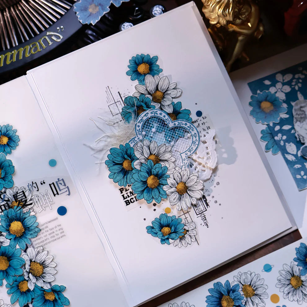 Card with blue and white floral design on a white background