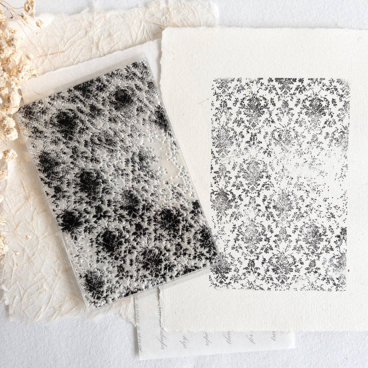 Vintage Background Clear Stamp aged texture impressions shown as two panels on a textured surface