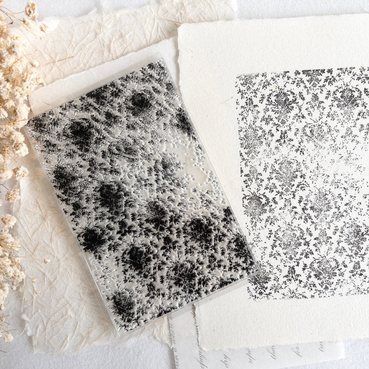 Two Vintage Background Clear Stamp textured square impressions displayed on a light background