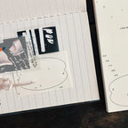 Collage of cut-out letters and phrases on a lined notebook page.