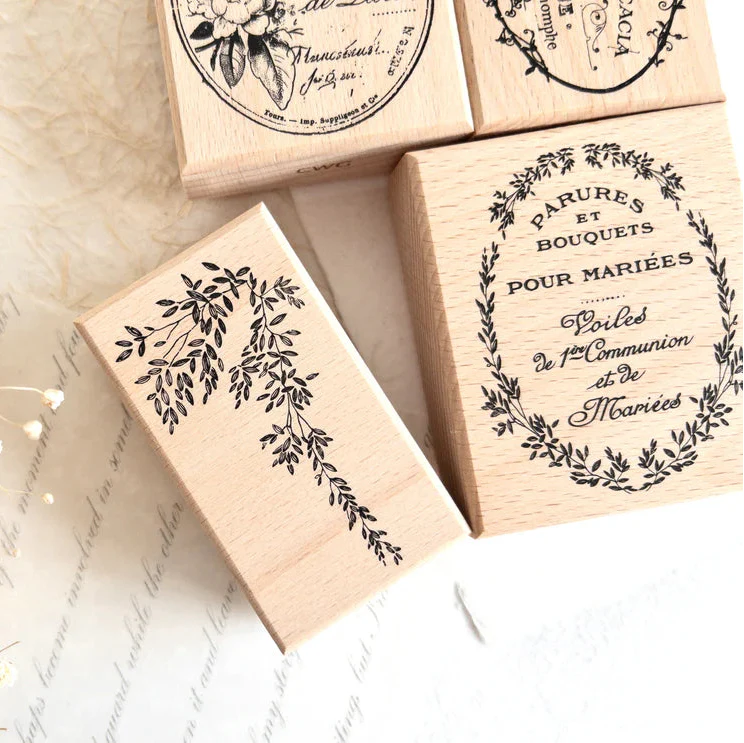 Four Vintage Rubber Stamp Set wooden stamps with botanical motifs and Parisian typography