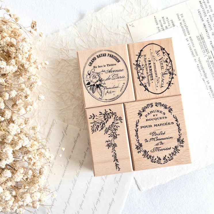 Vintage Rubber Stamp Set anniversary flat lay with dried flowers on a handwritten paper backdrop