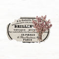 Vintage-style product label with dried lavender on a white background