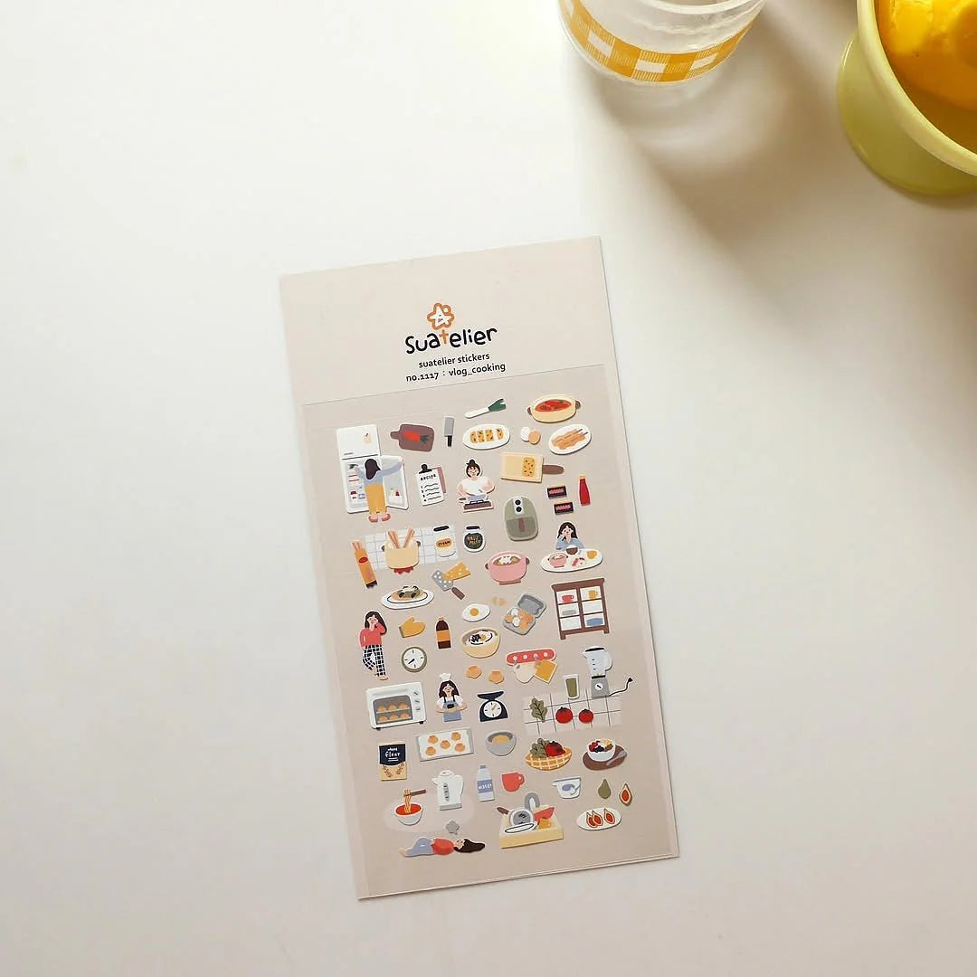 Sheet of stickers with various illustrations on a light surface, from the Vlog Cooking Sticker Sheet