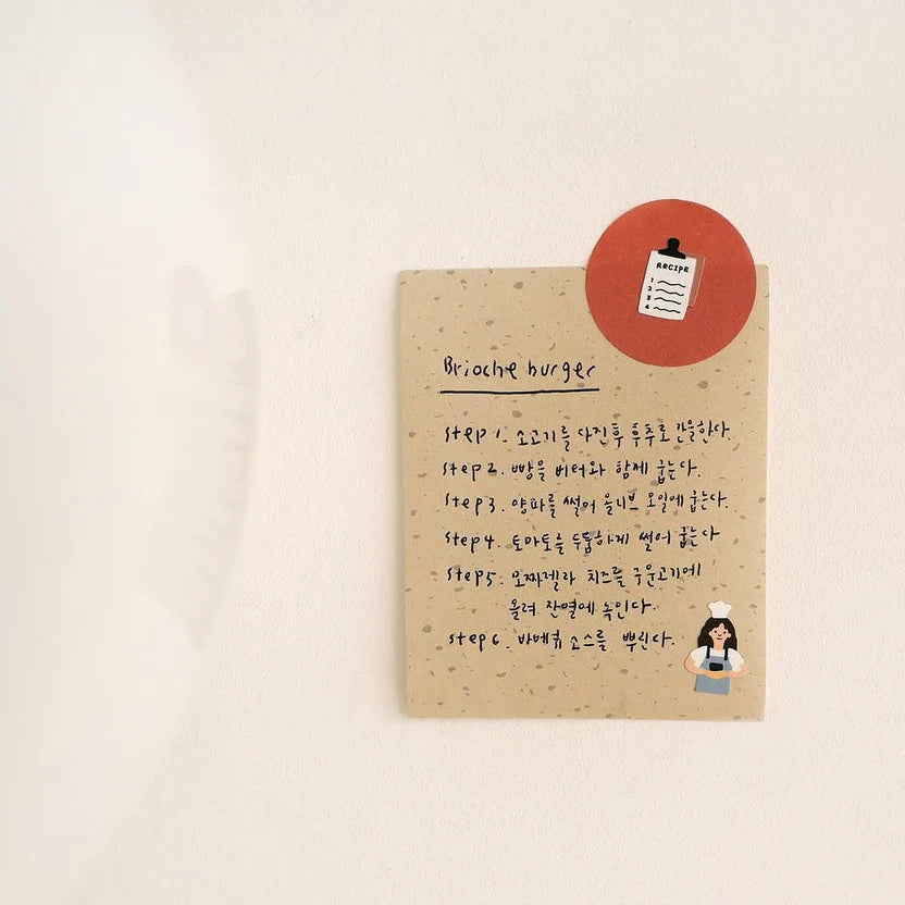 Notebook with handwritten text on a beige background, from the Vlog Cooking Sticker Sheet