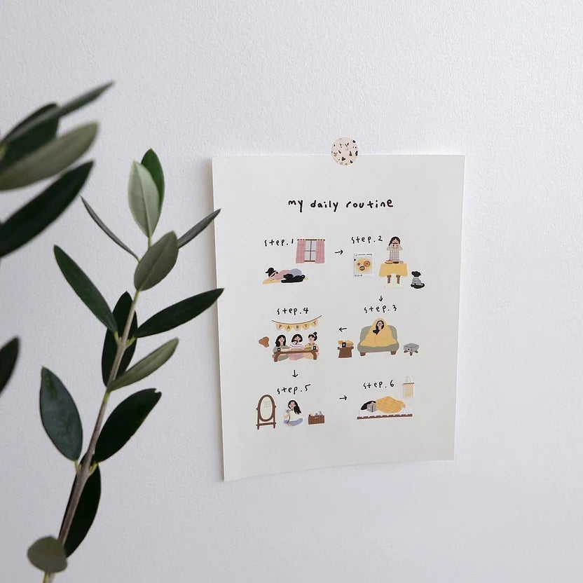 Sheet of paper with illustrated daily routine steps on a white surface with a plant.