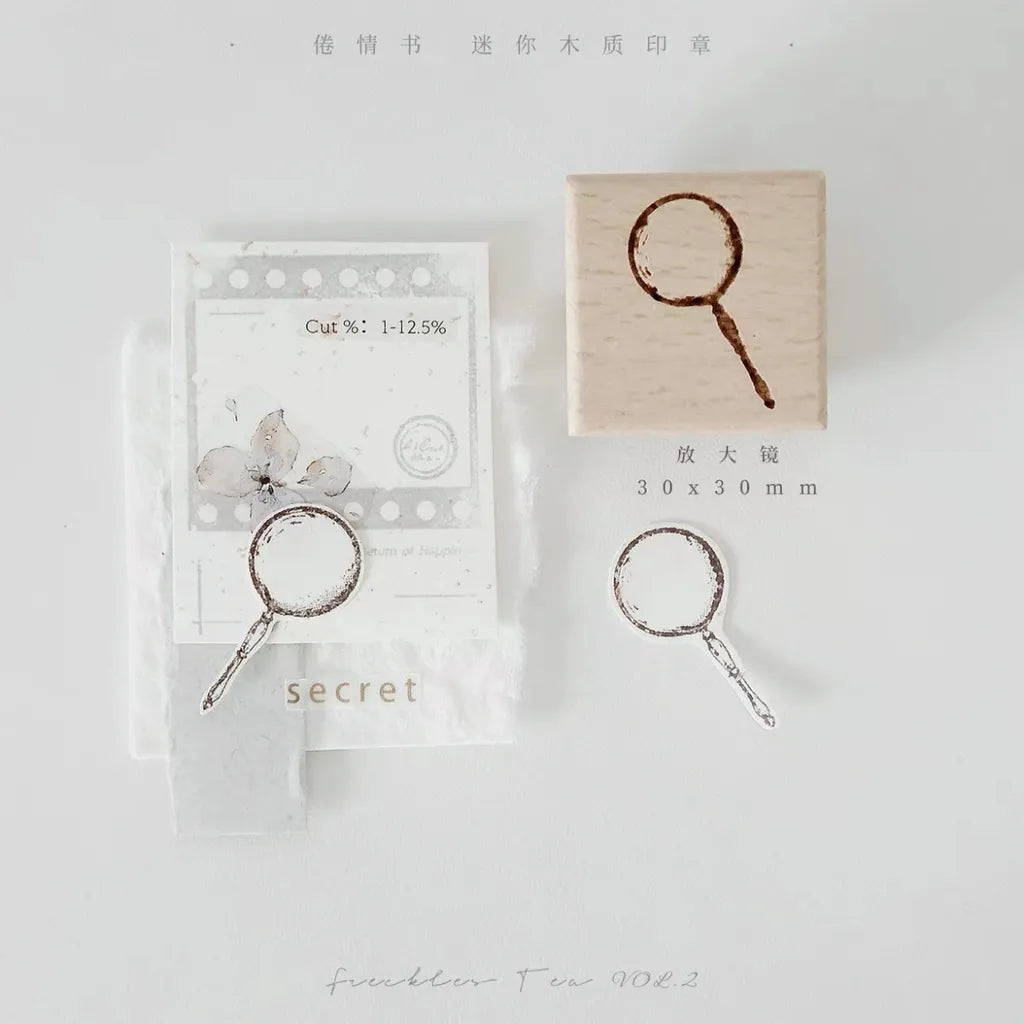 Magnifying Glass Rubber Stamp by Freckles Tea with vintage design on a white background