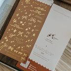 Twinkle And Ribbon Gold Foil Transparent Sticker