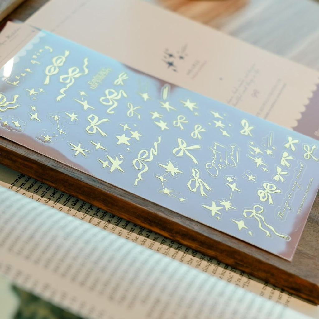 Twinkle And Ribbon Gold Foil Transparent Sticker