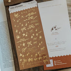 Twinkle And Ribbon Gold Foil Transparent Sticker