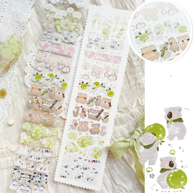 Set of decorative stickers with cute designs on a textured surface