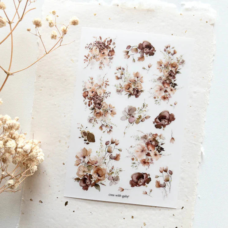 Warm Florals Transfer Sticker sheet on textured white with dried flowers along the sides