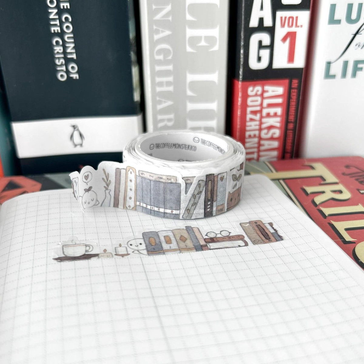 Painted Bookshelf Washi Tape by The Coffee Monsterz CO — roll of painted-bookshelf washi tape with books, for journaling