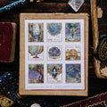 Collection of tarot cards in a vintage-style box with mystical and celestial designs.
