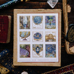 Collection of tarot cards in a vintage-style box with mystical and celestial designs.