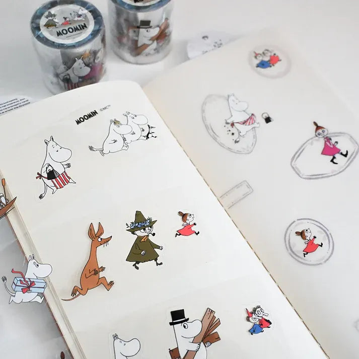 Moomin character stickers from the Where We Going Moomin Friends PET Tape styled on a notebook