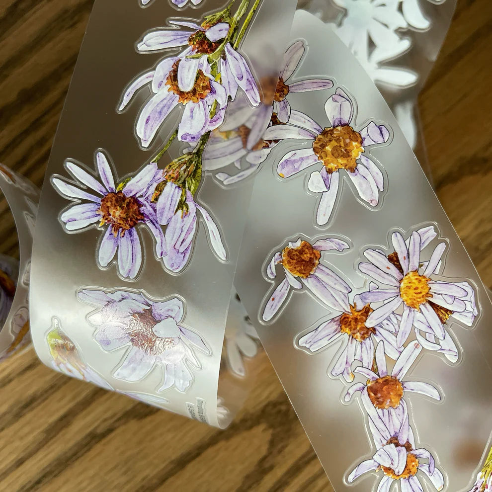 Roll of Wild Purple Flower A41 PET Tape purple blooms with orange centres, transparent