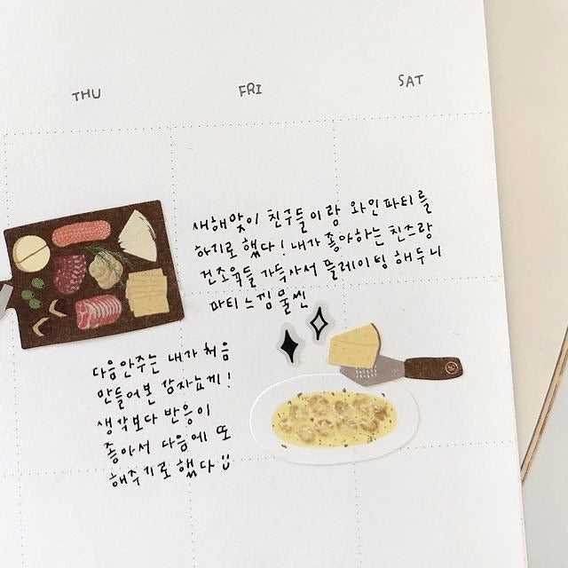 Weekly planner with food-themed stickers and text, from the Wine Bar Sticker Sheet