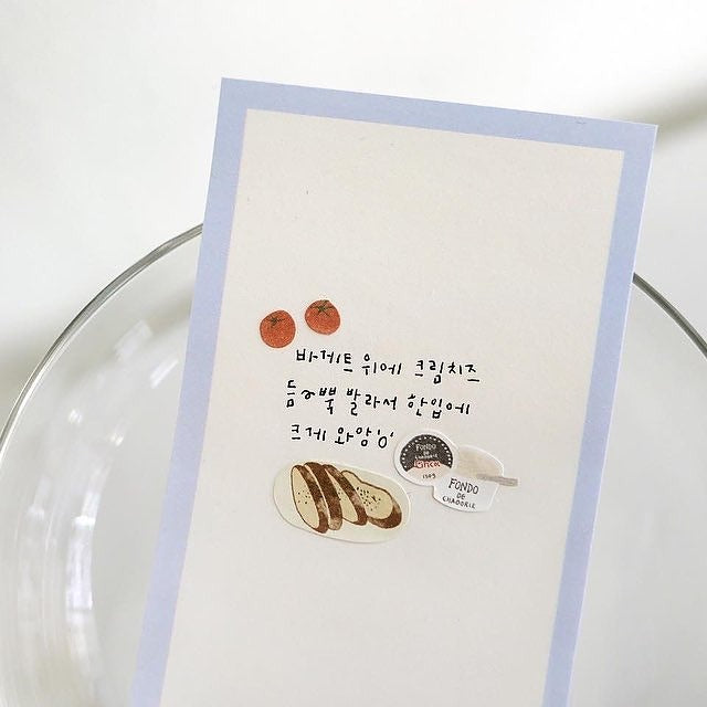 Card with bread illustrations and text on a white background, from the Wine Bar Sticker Sheet