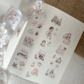 Sheet of decorative stickers with illustrations on a textured surface