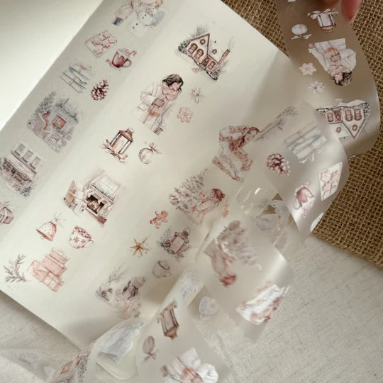 Sheet of Winter Wonderland PET Tape festive winter designs shown in full on a textured craft surface