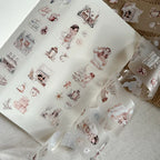 Sheets of decorative stickers with illustrations on a textured surface
