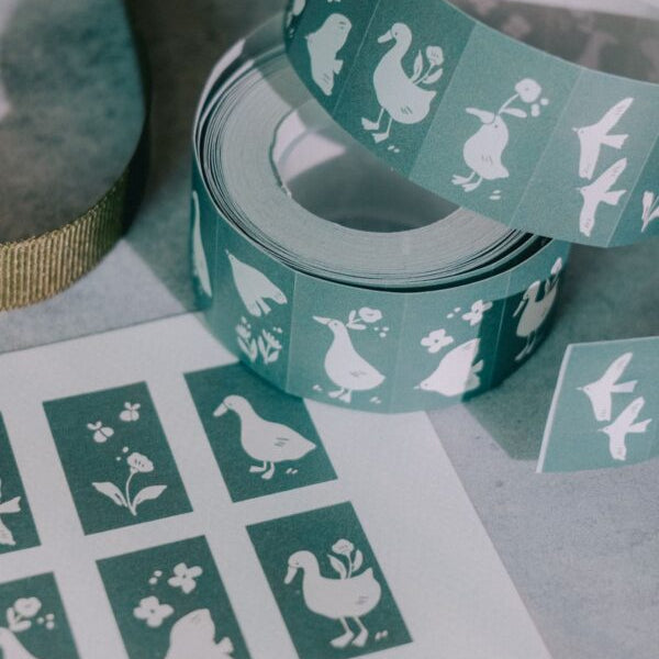 Close-up of Woodland Story Label Sticker Tape duck designs on a light grey backdrop