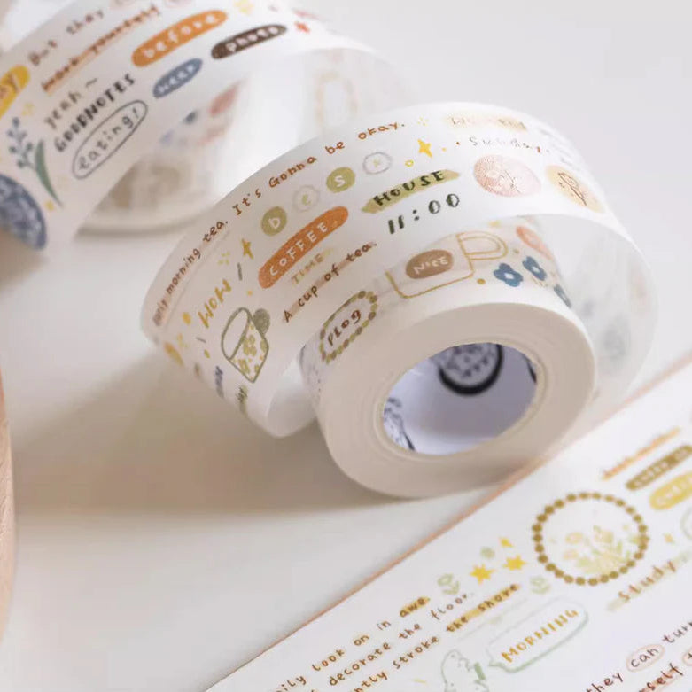 Words Washi Tape rolls by Orange Studio with printed word designs on a light surface, close-up