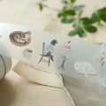 Sticker sheet with illustrations of a person, a cat, and other elements on a textured surface.