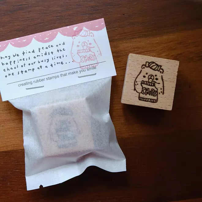 Foodie Bears Chips stamp with a stamped card and tea bag styled on a wooden surface