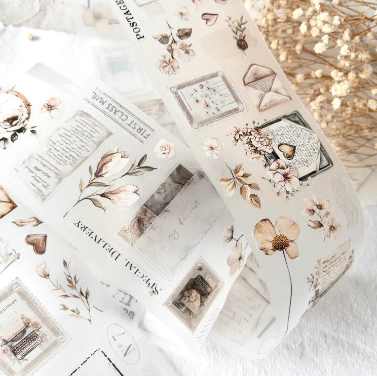 Sheets of Love Letters PET Tape romantic floral designs laid out together on a light background