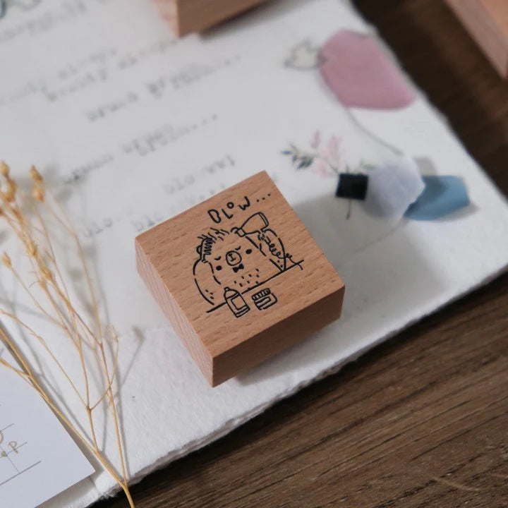 Beary Ordinary Days 04 blow-dry bear stamp displayed on a marble surface, close-up view