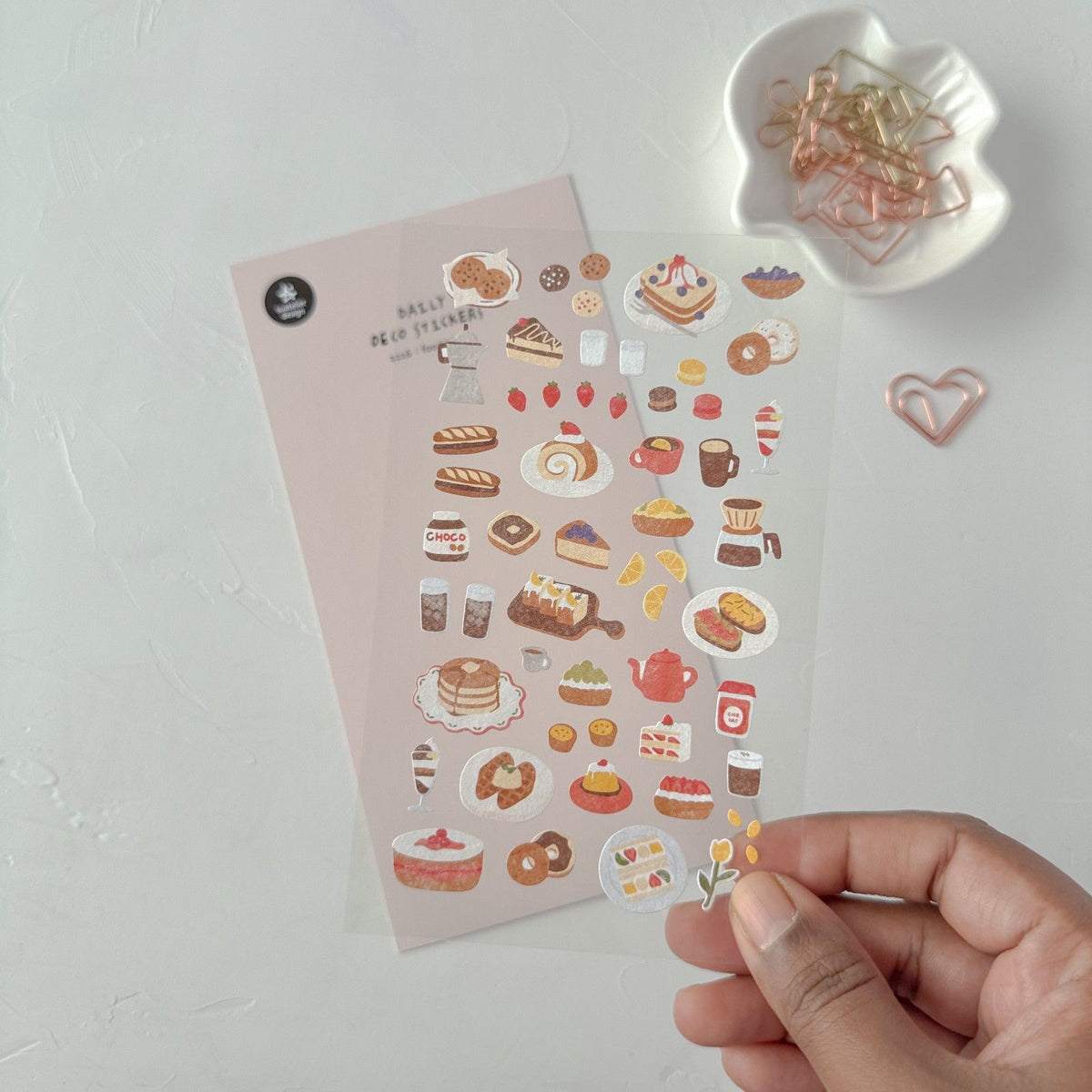 Sheet of food-themed stickers held by a hand, from the Food Trip 4 Sticker Sheet