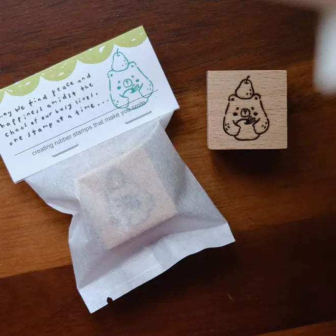Foodie Bears Fruits stamp styled with a tea bag and stamped card on a wooden surface