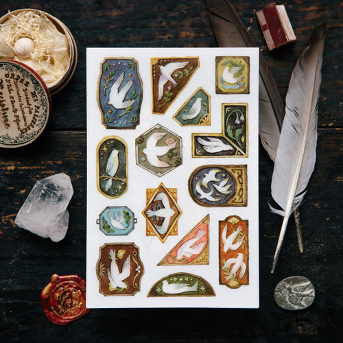 Birds Transfer Sticker by OURS Studio — dove-and-bird rub-on transfer sticker sheet styled with props, for journaling