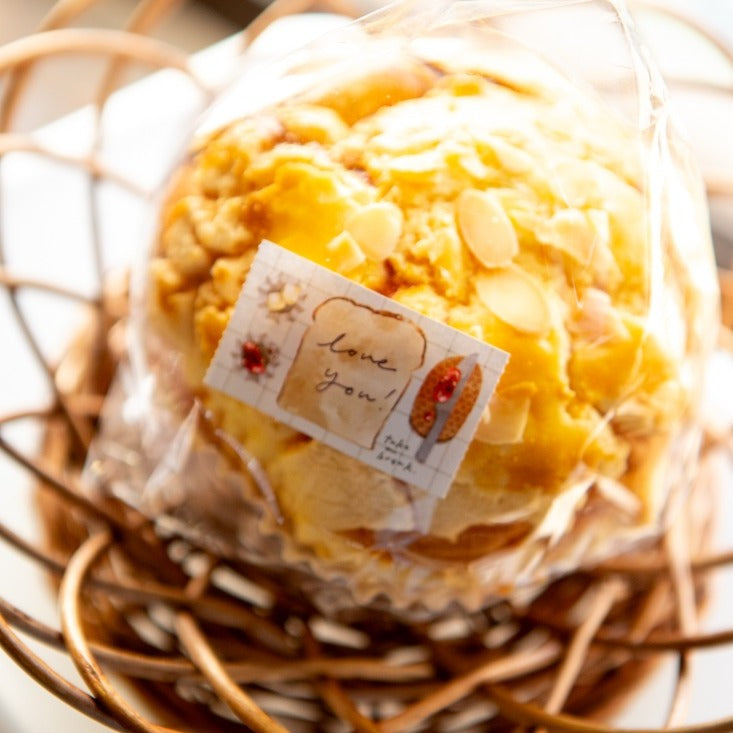 Sweet Hours Label Sticker Tape by OURS Studio — pastry with a 'love you' label tag, styled shot, for journaling